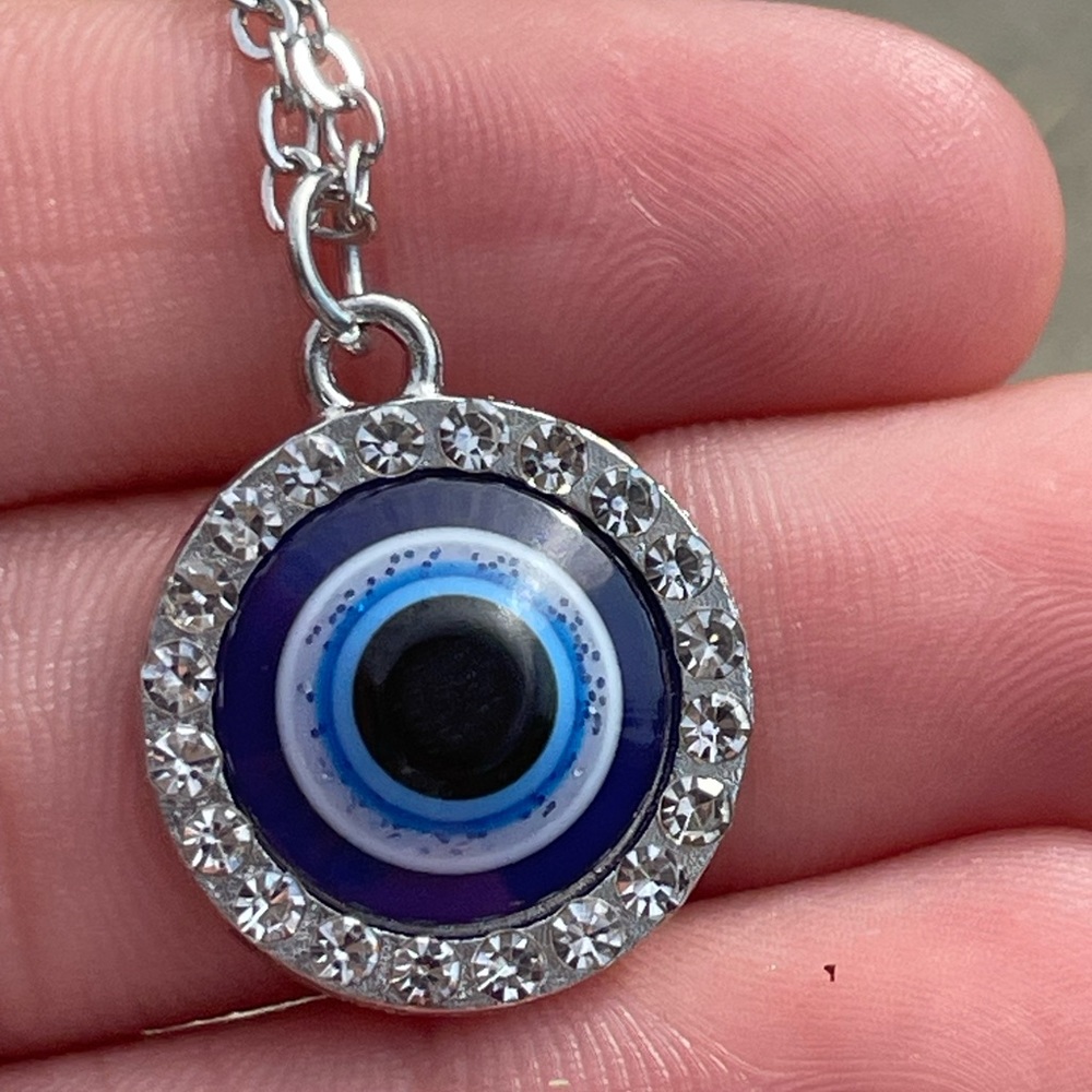 Evil Eye Sparkly Round necklace with long silver chain.